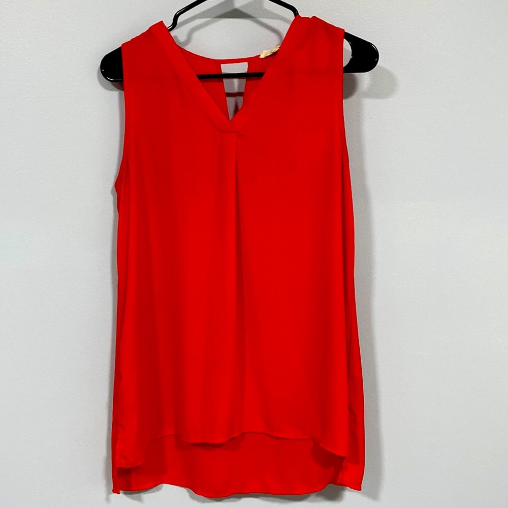 Red sleeveless blouse